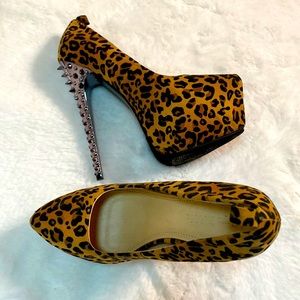 Never worn leopard print super sexy high heels!! Size 8!